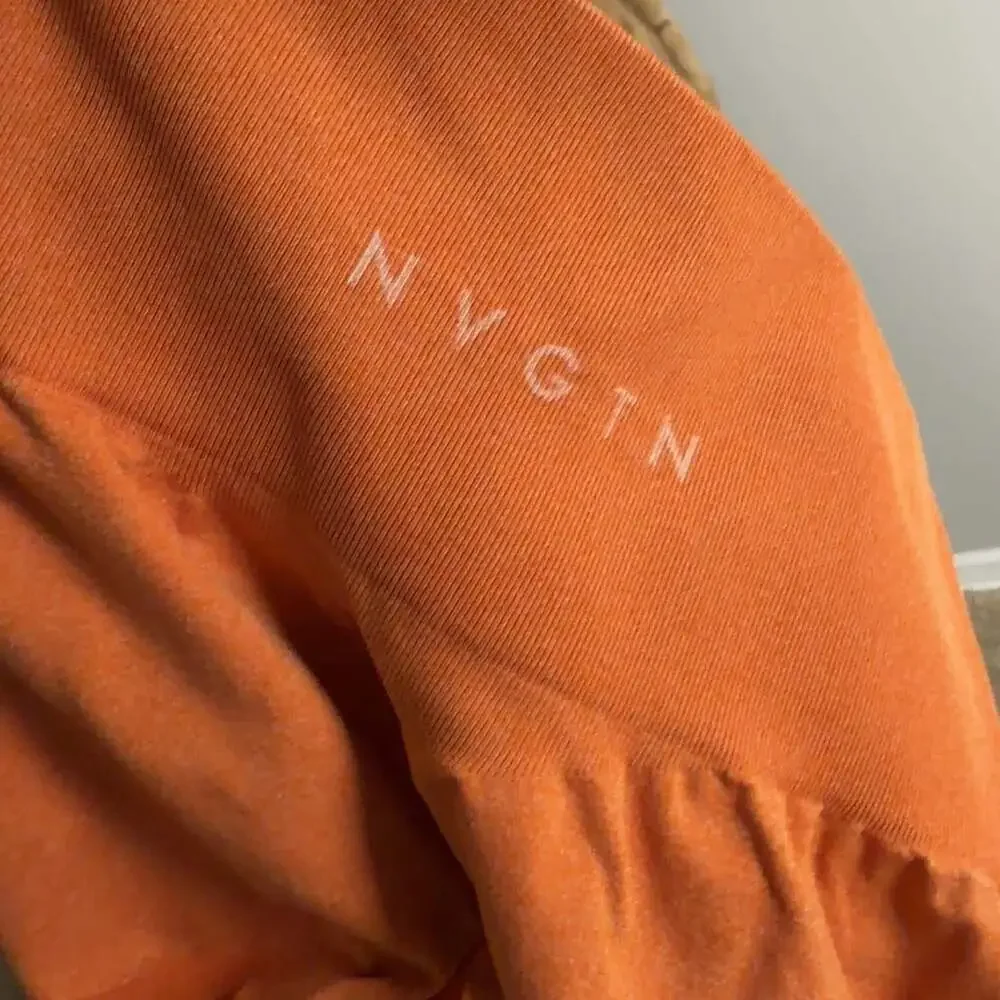NVGTN Seamless High Waisted Leggings Size Medium Orange Athletic Gym Women’s